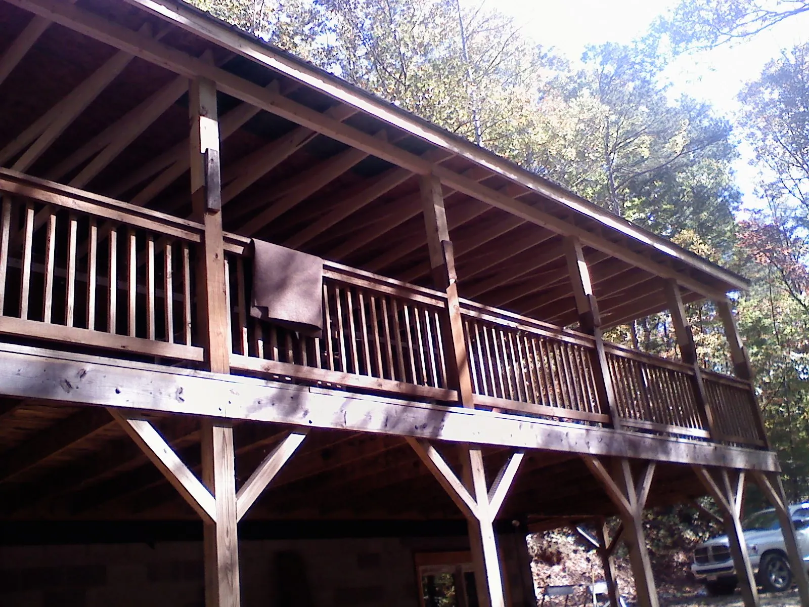 Timber framing under a new elevated porch and deck — Roof Leak Repair in Phelps by Roofing Brothers